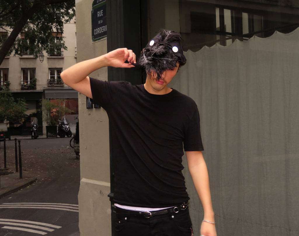 Plumed caphead