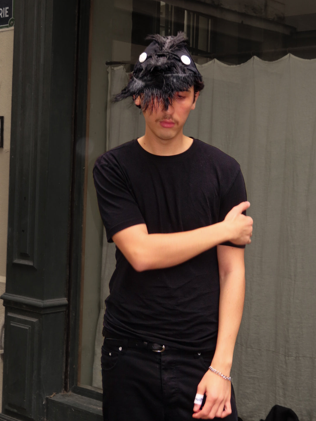 Plumed caphead