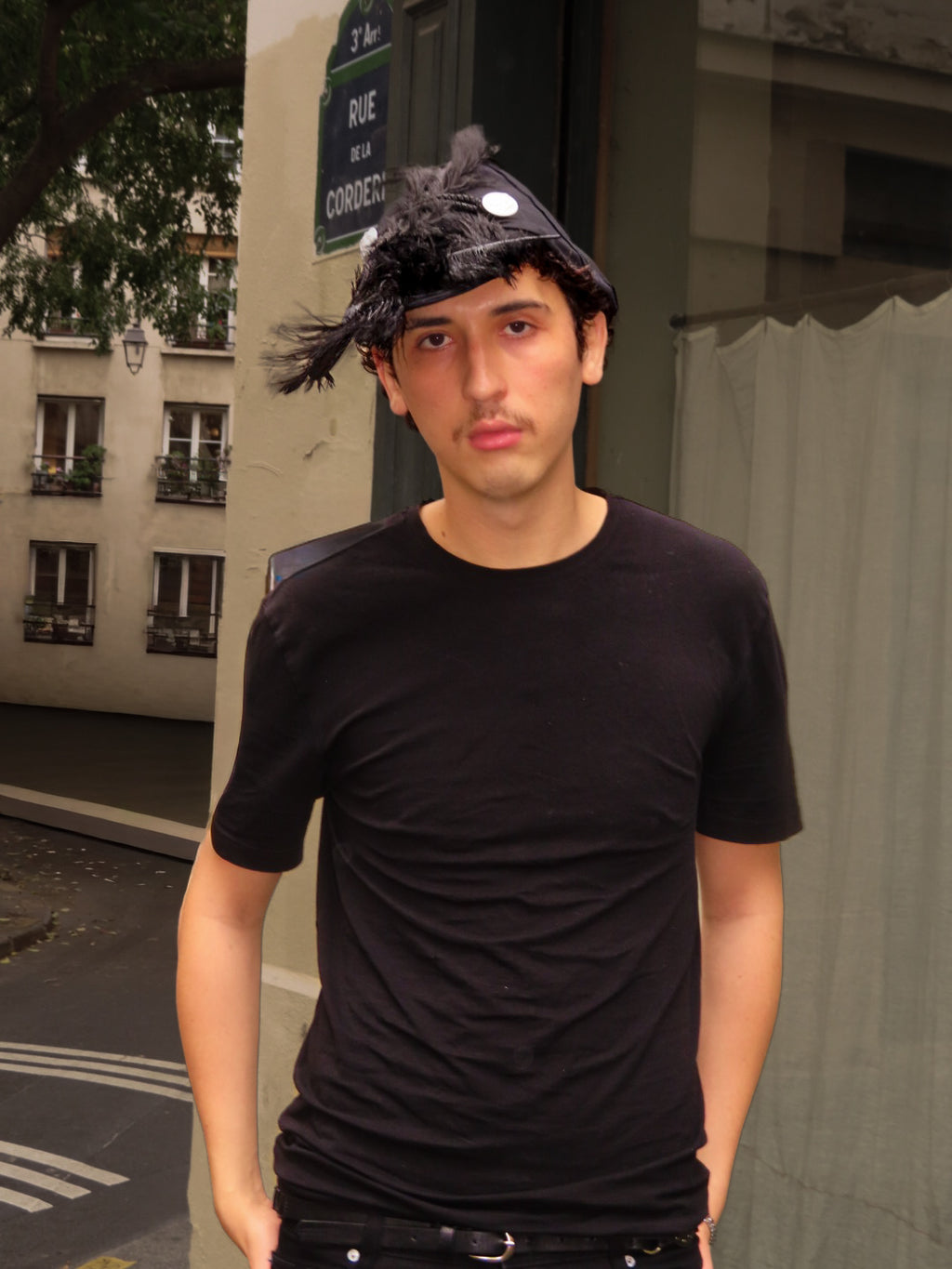 Plumed caphead