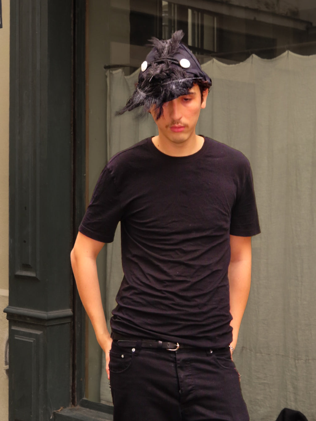 Plumed caphead